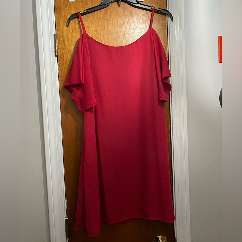 Medium red dress, peek a boo shoulders. Short sleeves